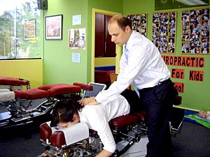 research Chriopractor making an adjustment